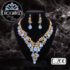Set collar y aretes Dorados con Celeste