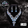 Set collar y aretes Plateados con Celeste