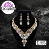 Set collar y aretes Dorados con Blanco