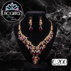 Set collar y aretes Dorados con Corinto